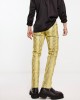 skinny leather-look pants in yellow snake print with zip detail