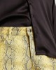 skinny leather-look pants in yellow snake print with zip detail